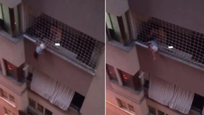 Denizli’de küçük bir çocuk balkon koruma filesinin dışında asılı kaldı.