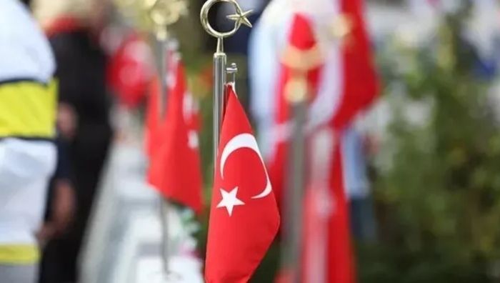 Çalışma ve Sosyal Güvenlik Bakanı Vedat Işıkhan, şehit yakınları, gaziler